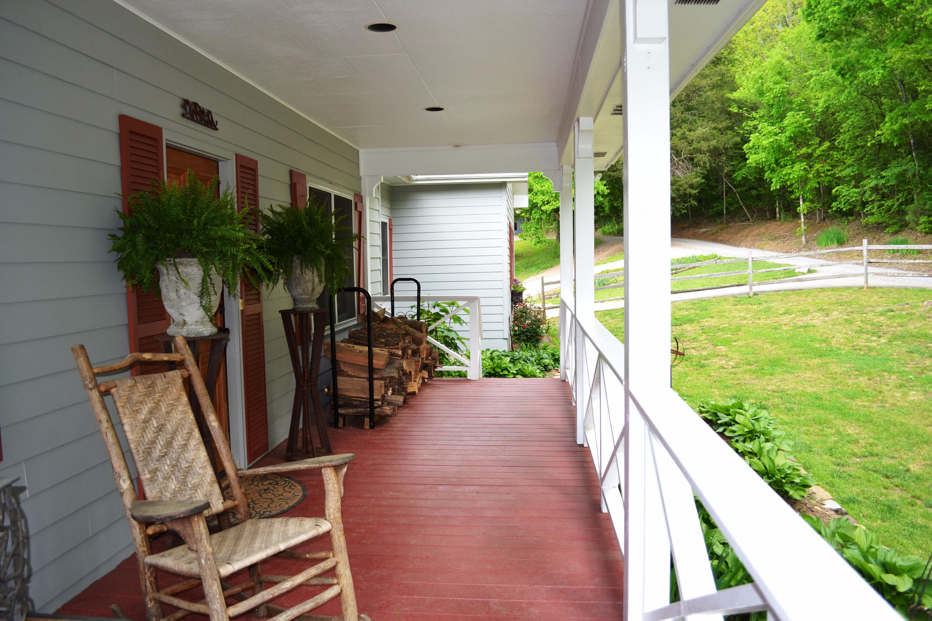 625 New England Road Wildwood, GA 30757 - Photo 8 of 59 Covered porch interior 2