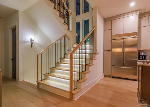 a view of a hallway with staircase