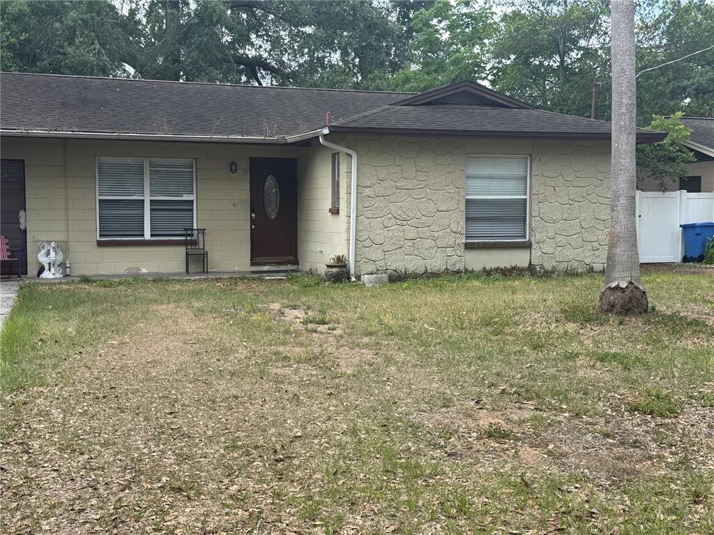 201 Lentz Road Brandon, FL 33510 - Photo 1 of 8 a view of a house with a yard