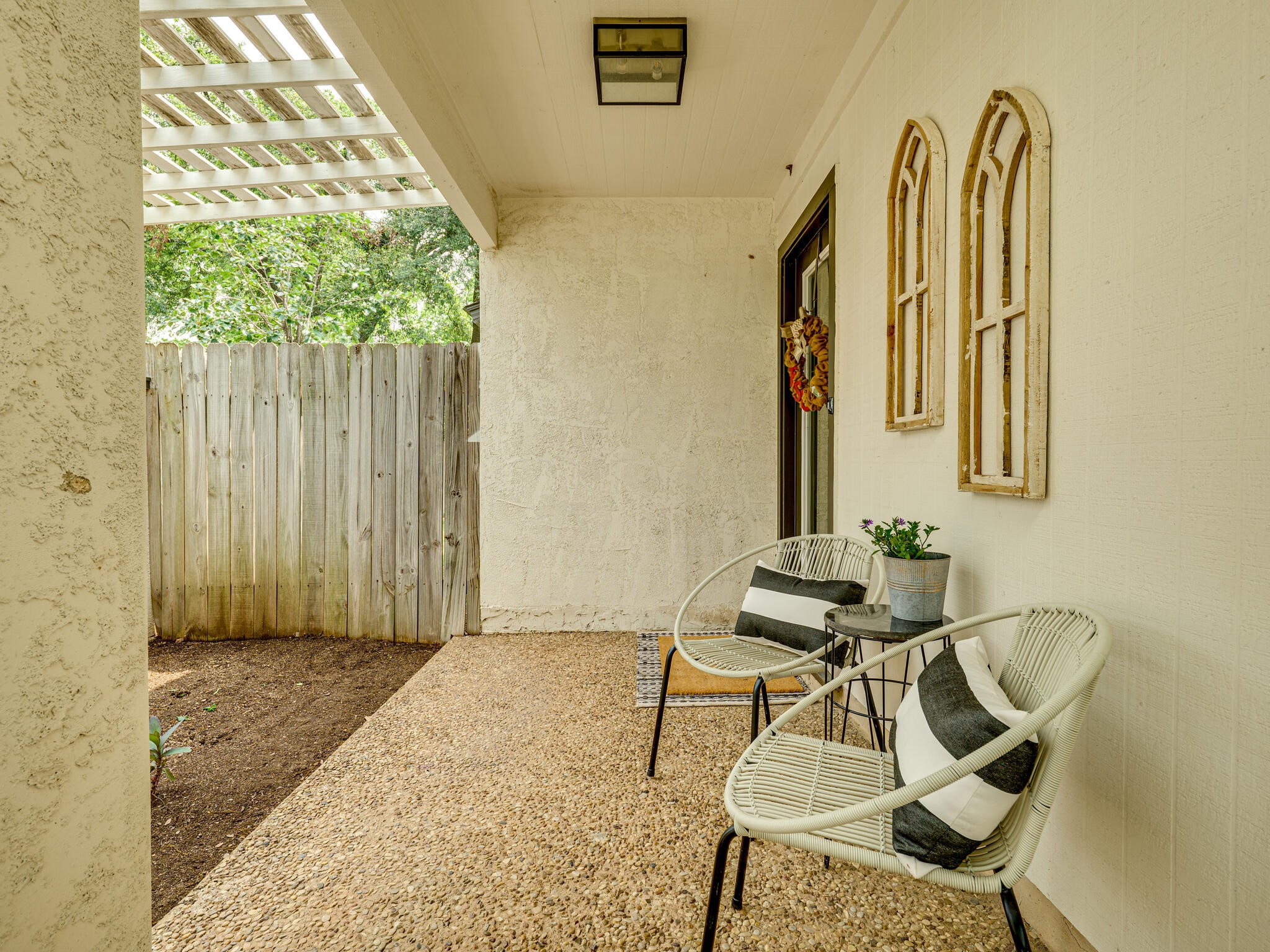 3203 Foster Lane Austin, TX 78757 - Photo 30 of 37 This covered porch is a great space for sitting with a cup of coffee or glass of wine. Could also be a great courtyard!