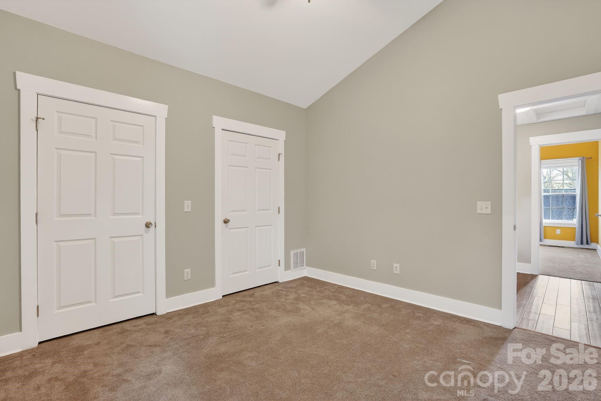 155 North Fork Road Black Mountain, NC 28711 - Photo 17 of 26 an empty room with windows and entrance