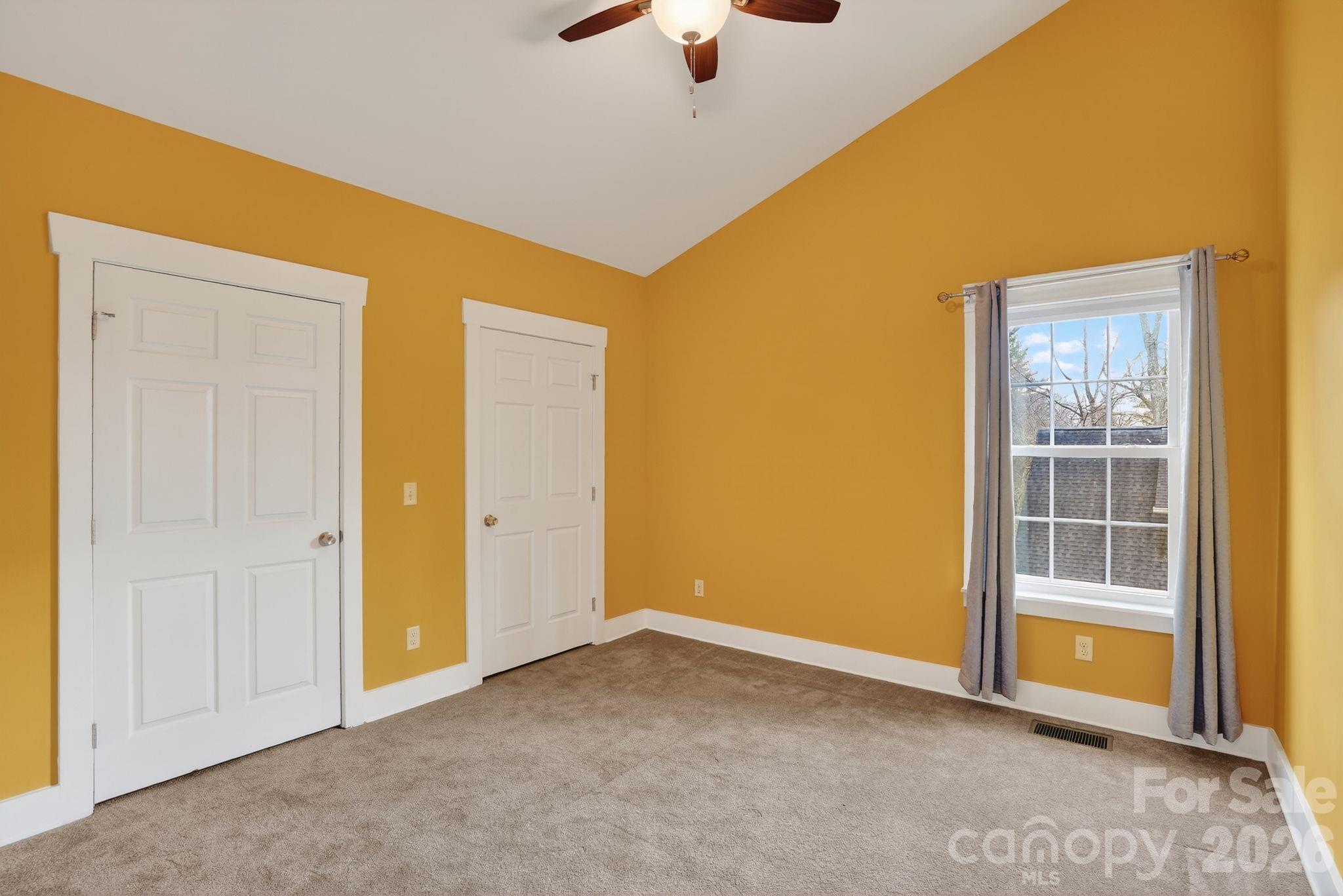 155 North Fork Road Black Mountain, NC 28711 - Photo 20 of 26 an empty room with closet and windows