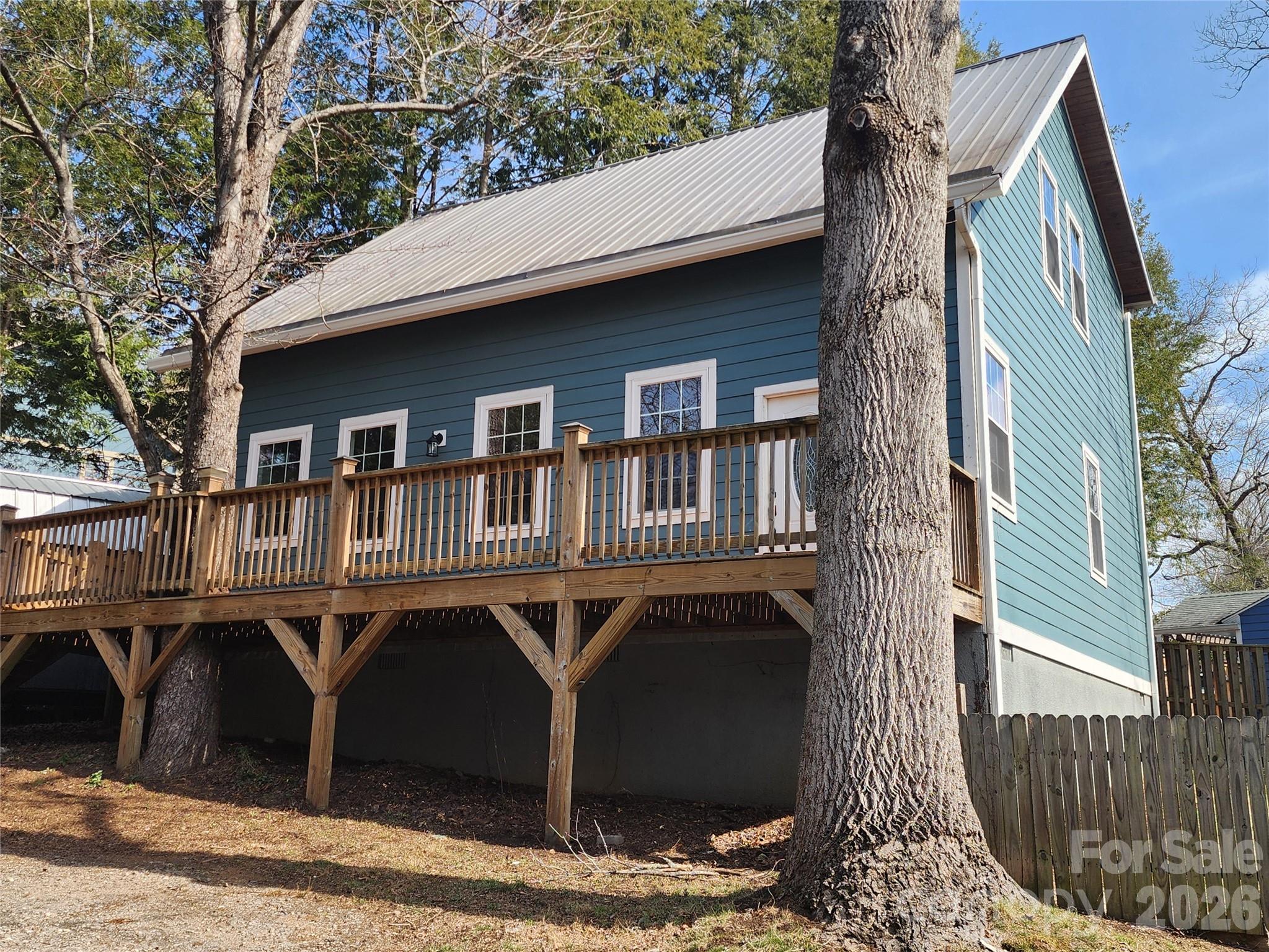 155 North Fork Road Black Mountain, NC 28711 - Photo 2 of 26 a front view of a house with balcony