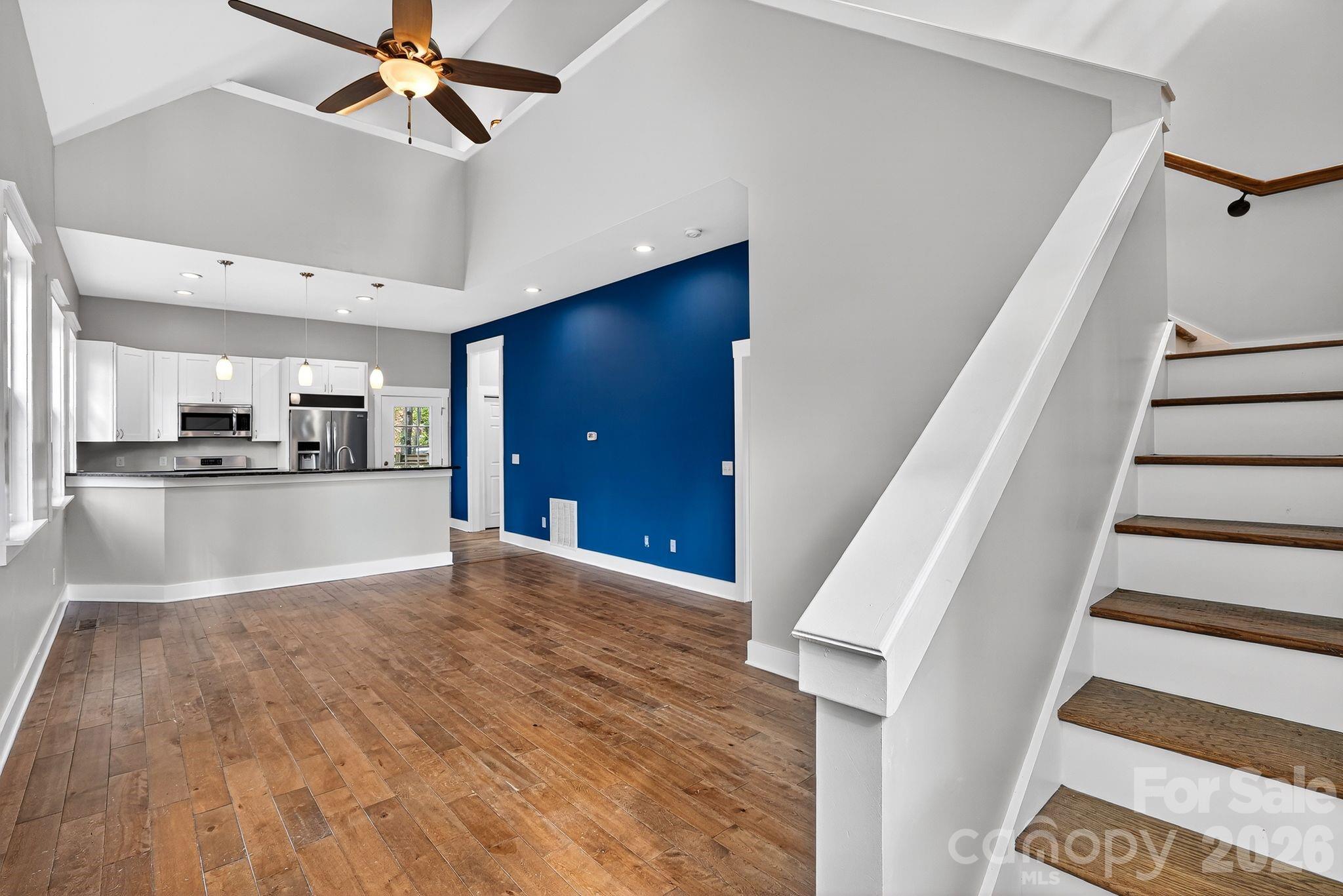 155 North Fork Road Black Mountain, NC 28711 - Photo 5 of 26 a view of a kitchen with wooden floor and a kitchen