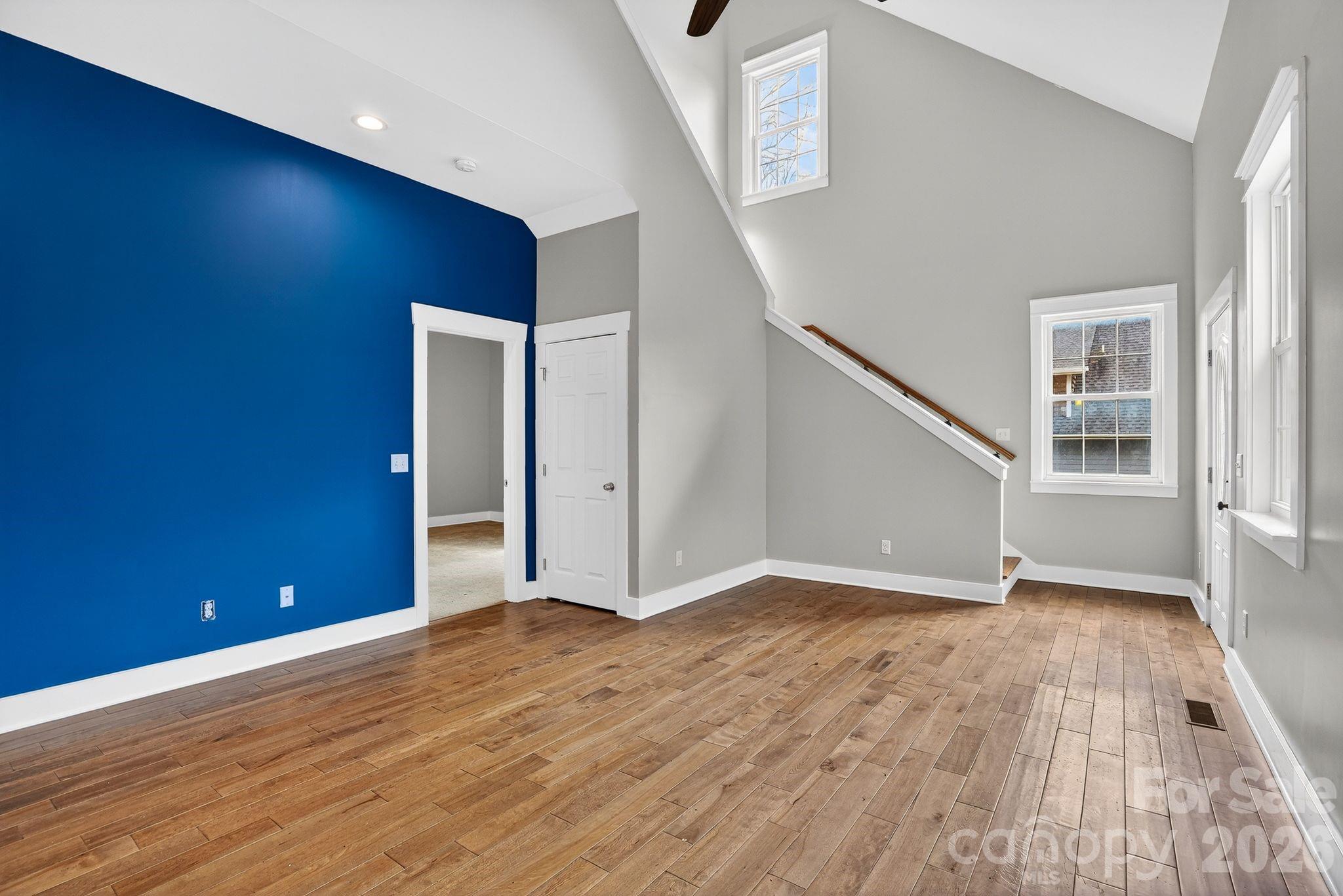 155 North Fork Road Black Mountain, NC 28711 - Photo 6 of 26 wooden floor in an empty room with a window