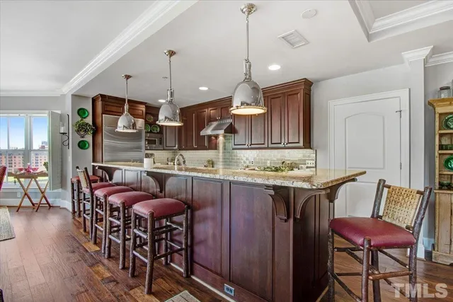 a view of kitchen and dining area with furniture