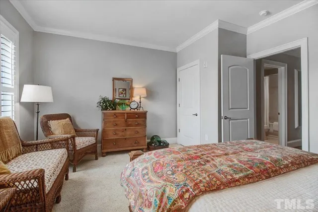 a bedroom with a bed and furniture