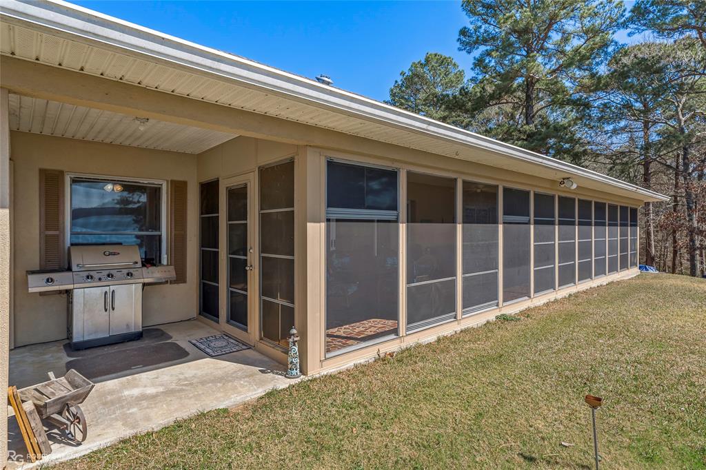 758 Featherston Road Homer, LA 71040 - Photo 15 of 32 Lanai with side cook area