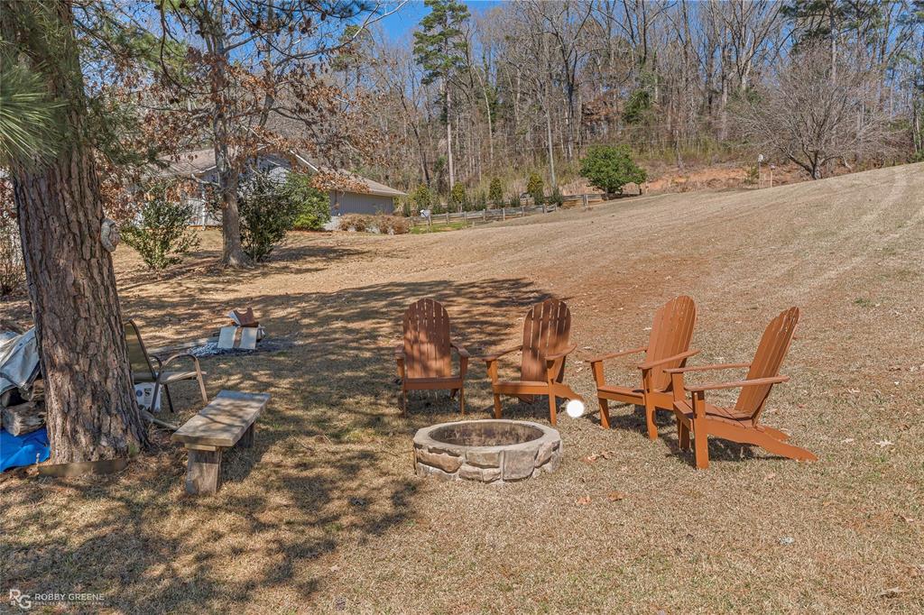 758 Featherston Road Homer, LA 71040 - Photo 25 of 32 Firepit next to the water