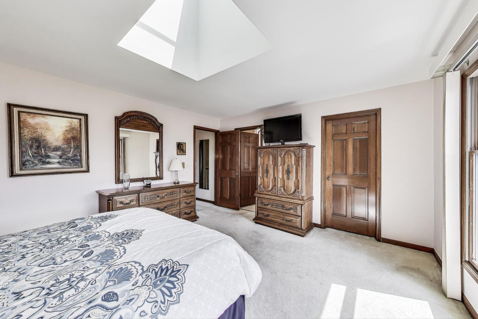 2080 Carolyn Road Aurora, IL 60506 - Photo 26 of 50 a bedroom with furniture and large window