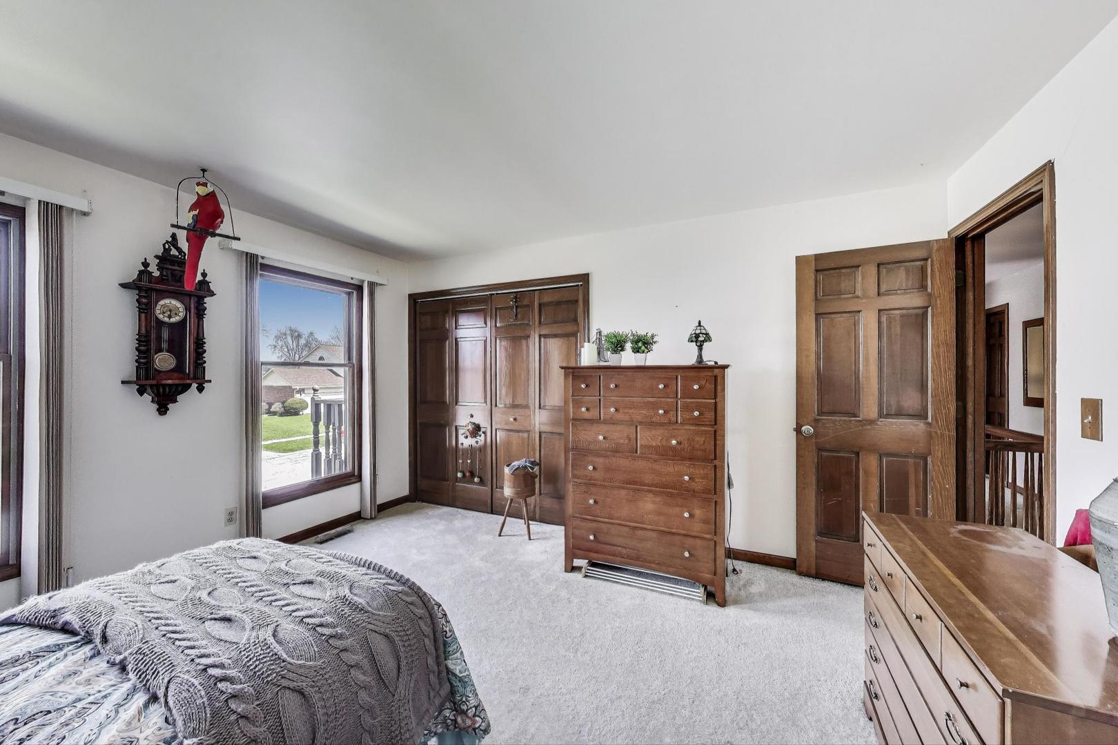 2080 Carolyn Road Aurora, IL 60506 - Photo 30 of 50 a bedroom with a bed and a window