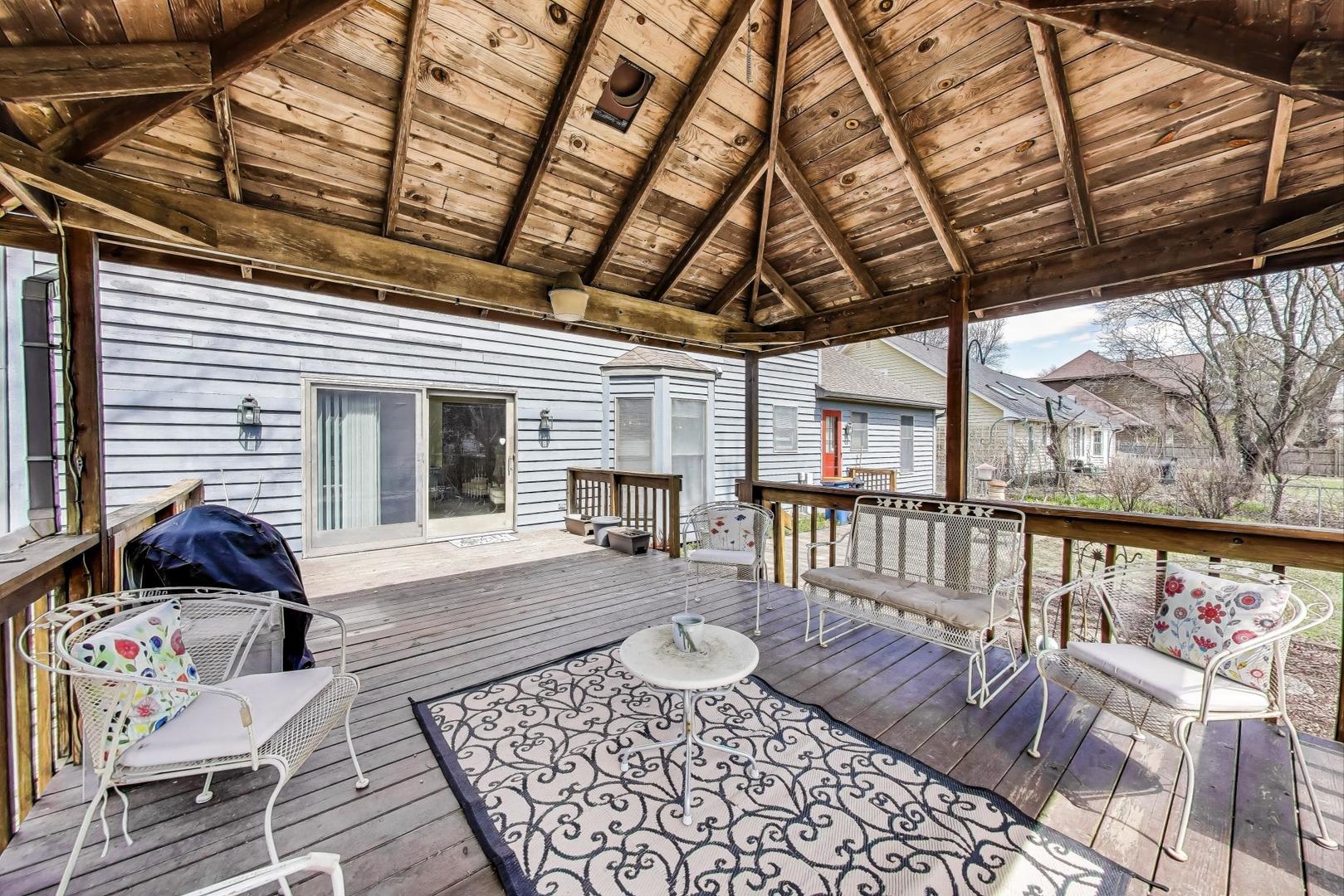 2080 Carolyn Road Aurora, IL 60506 - Photo 38 of 50 a balcony with furniture and rug