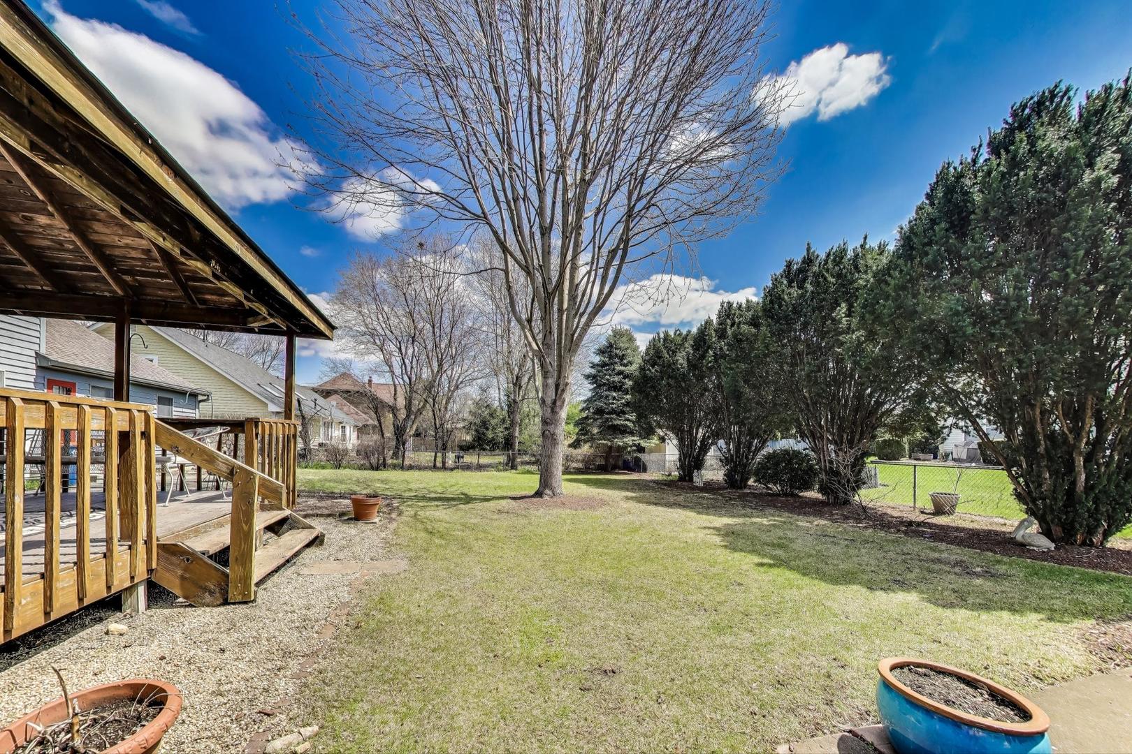 2080 Carolyn Road Aurora, IL 60506 - Photo 45 of 50 a view of outdoor space with deck and tree