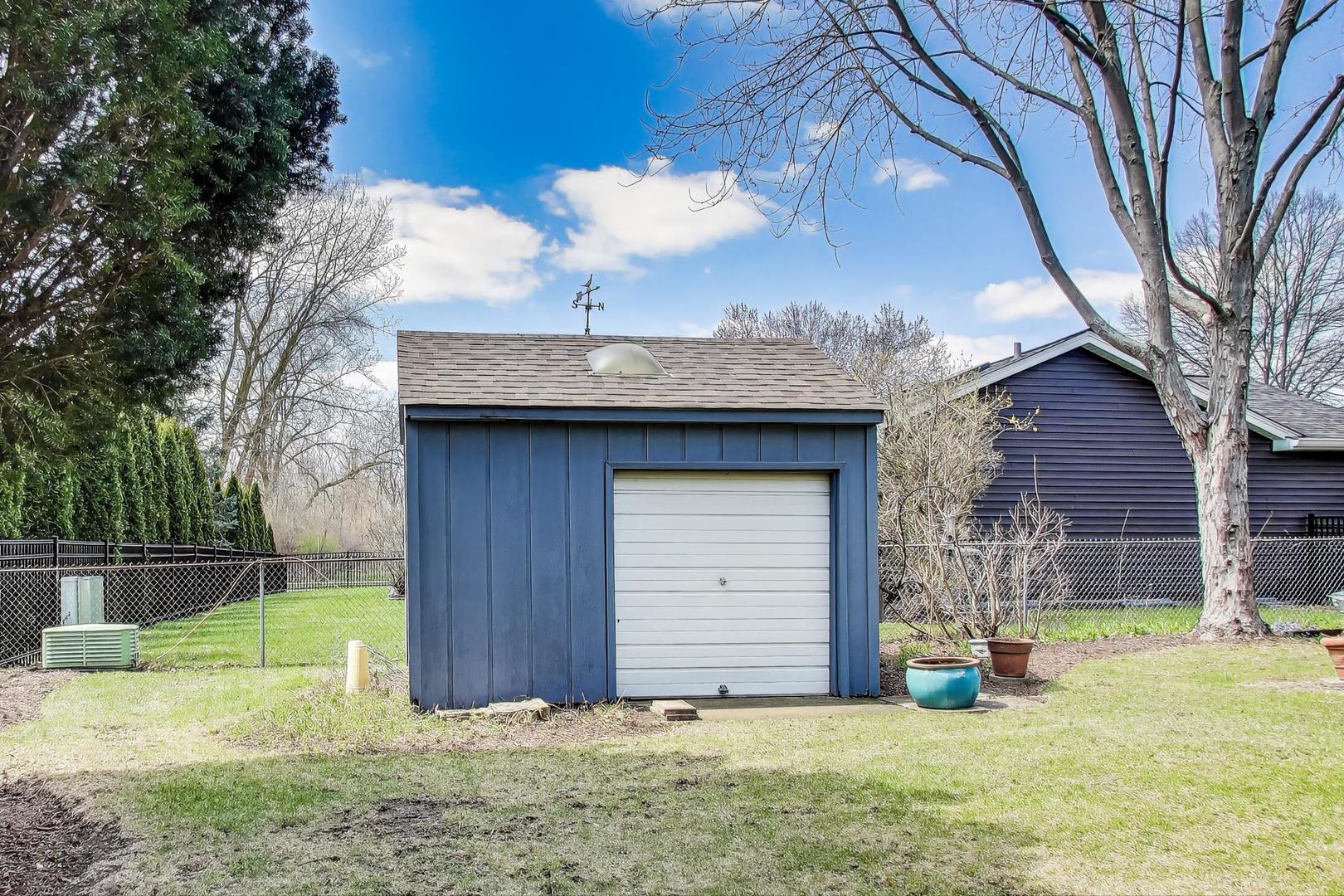 2080 Carolyn Road Aurora, IL 60506 - Photo 47 of 50 a view of a house with a yard