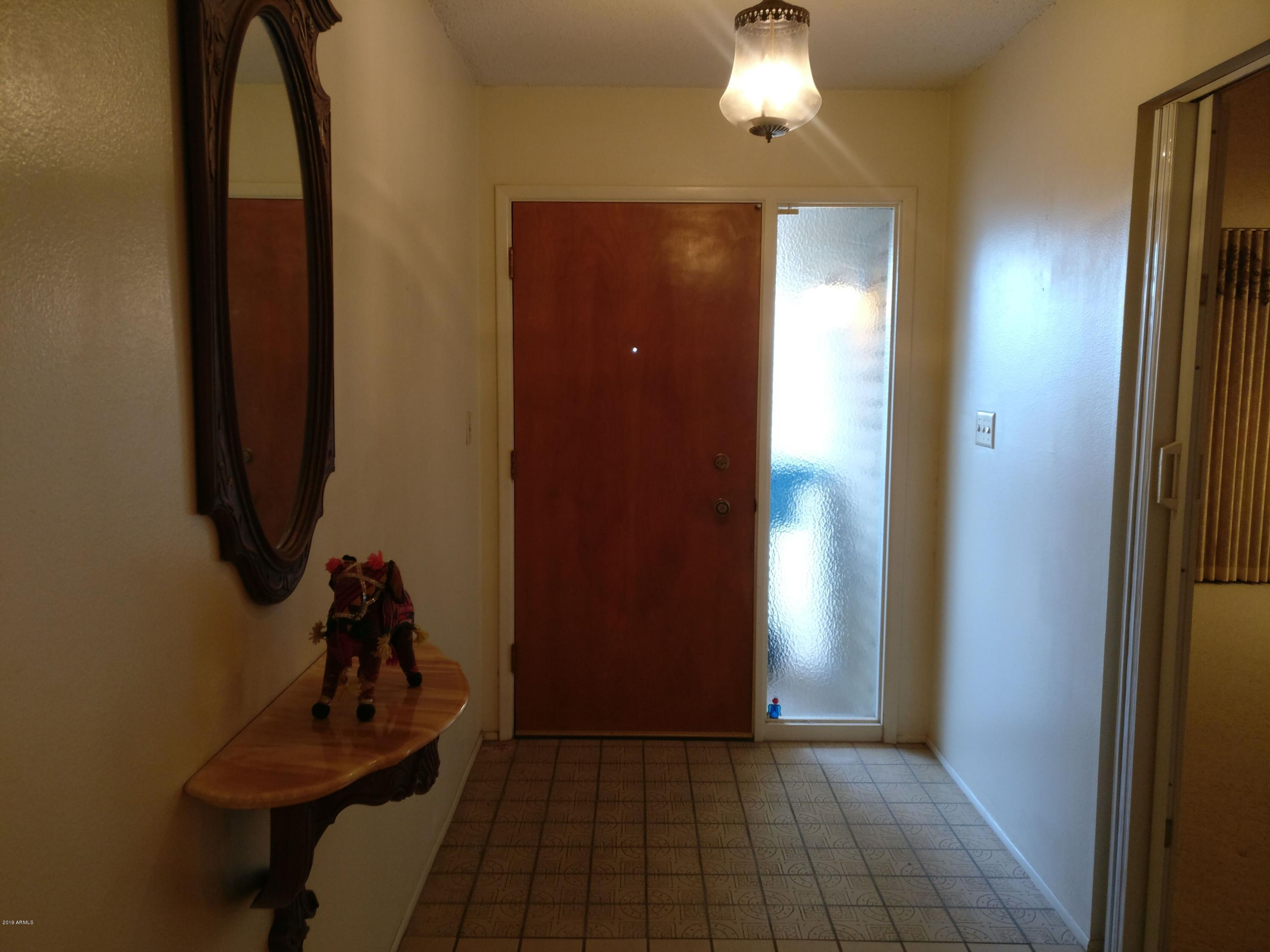 3733 West Ocotillo Road Phoenix, AZ 85019 - Photo 23 of 24 a view of a room with gym equipment