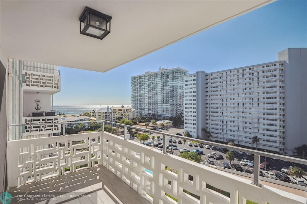1900 South Ocean Drive, Unit 905 Fort Lauderdale, FL 33316 - Photo 3 of 41 Private balcony with unobstructed ocean views and new ceramic tile throughout, including the balcony, with upgraded sound-absorbing underlayment.