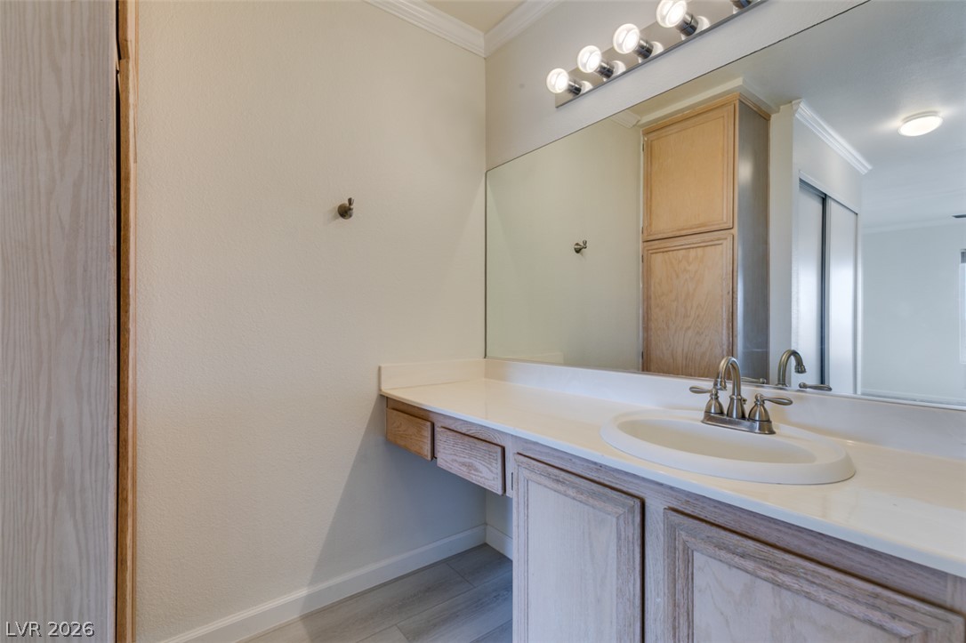 8070 West Russell Road, Unit 2026 Las Vegas, NV 89113 - Photo 33 of 41 A well-appointed vanity area featuring a single basin sink and ample counter space for daily routines.