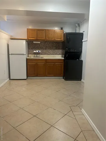 a bathroom with a shower and toilet