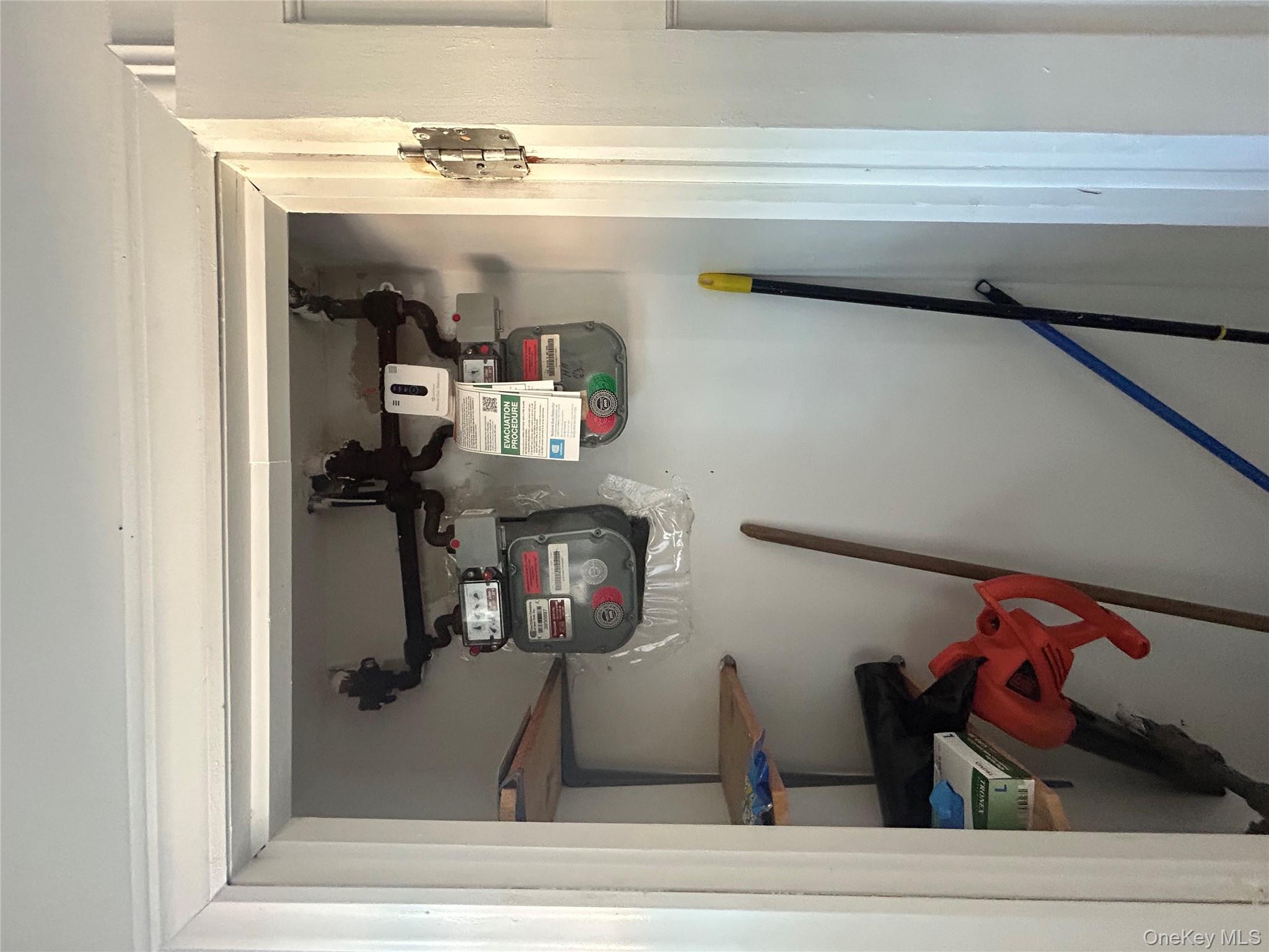 141 Sterling Avenue Yonkers, NY 10704 - Photo 16 of 23 a view of storage and utility room with racks on the wall