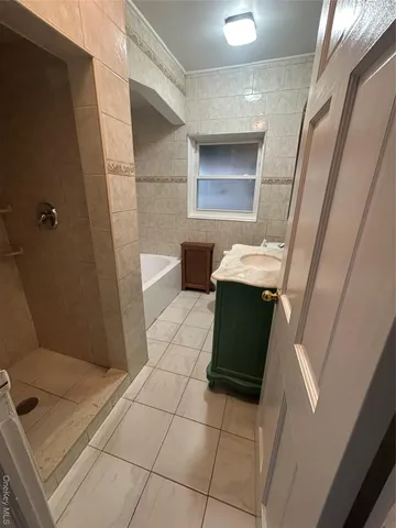 a kitchen with a stove and a sink