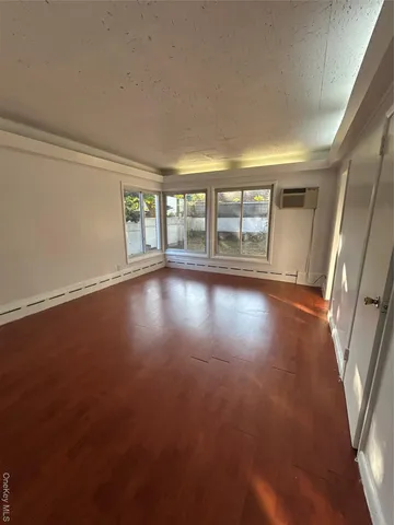 a view of livingroom with hardwood floor and window