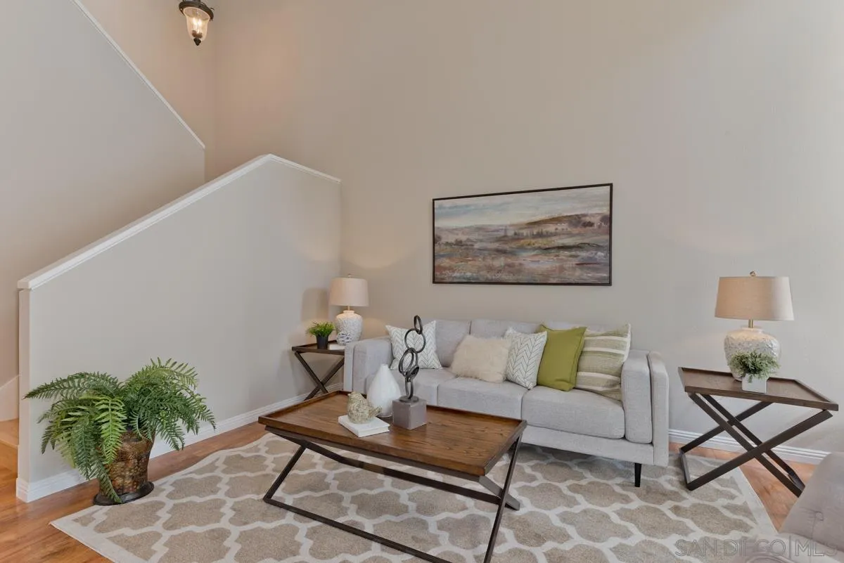 12515 Spindletop Road San Diego, CA 92129 - Photo 17 of 32 a living room with furniture and a potted plant