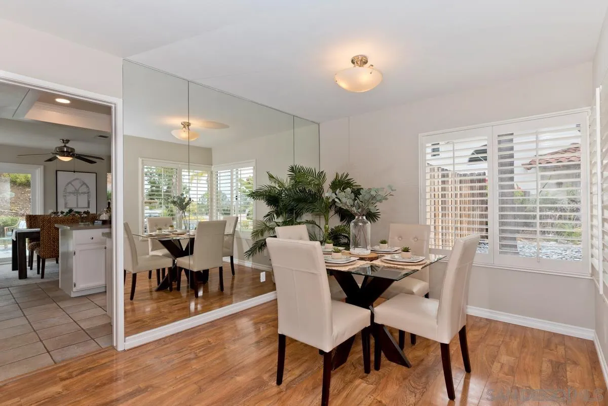12515 Spindletop Road San Diego, CA 92129 - Photo 4 of 32 a view of a dining room with furniture window and outside view
