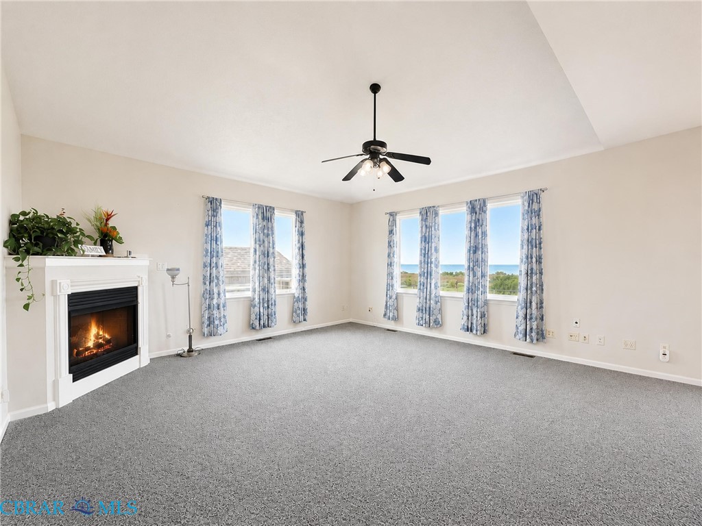 1214 Dandy Loop Road Yorktown, VA 23692 - Photo 24 of 65 a view of an empty room with window and fireplace