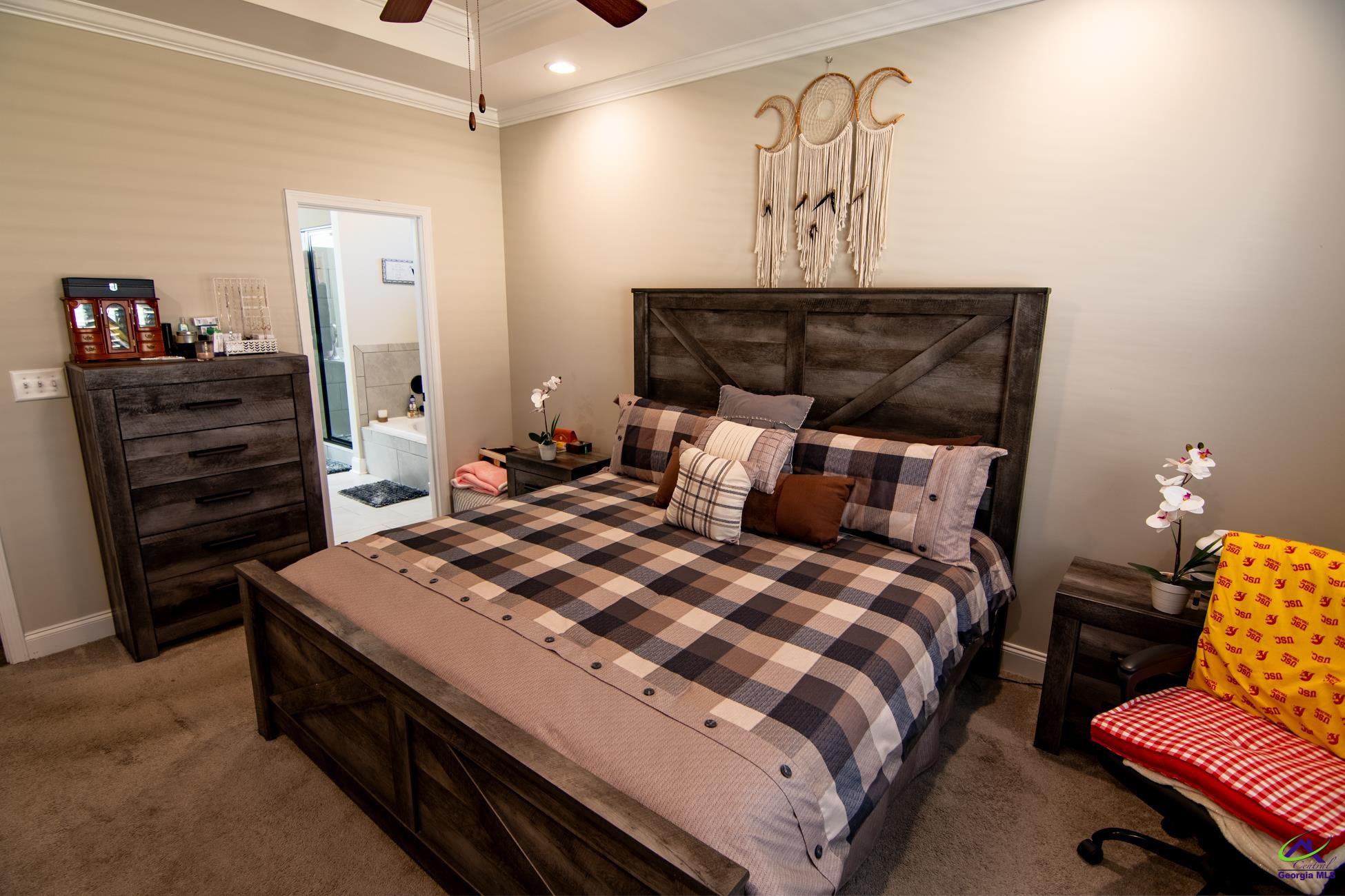 123 Logan's Mill Trail Warner Robins, GA 31093 - Photo 10 of 23 a bedroom with bed and window