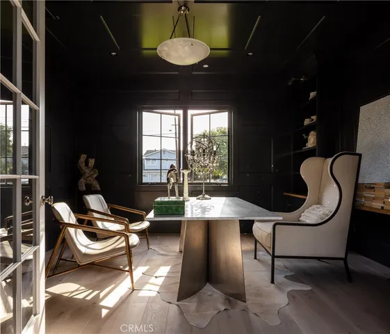 a bedroom with a bed and a couch