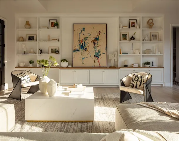 a bedroom with a large bed and a large window