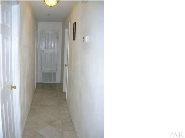 4250 Stephens Road Pace, FL 32571 - Photo 6 of 7 Hallway - Notice the tile floors
