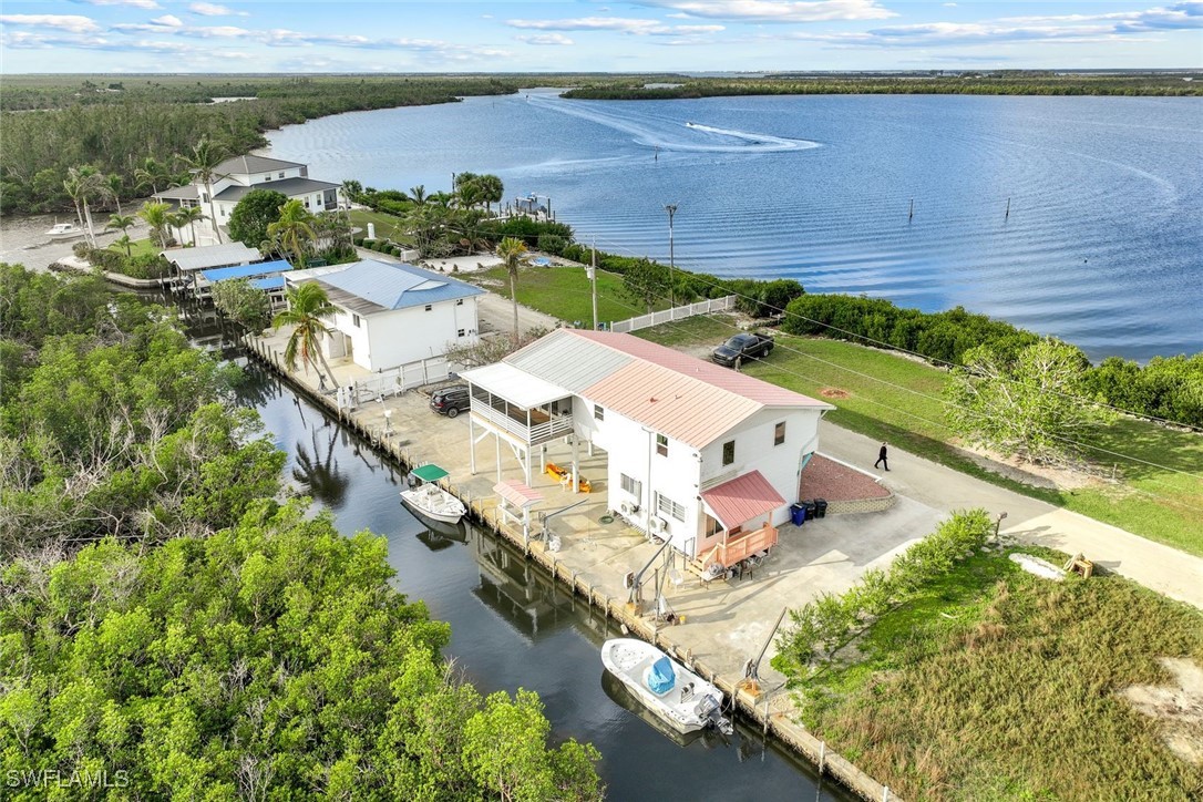 8151 Moyer Lane Bokeelia, FL 33922 - Photo 26 of 49 a picture of city view with lake view