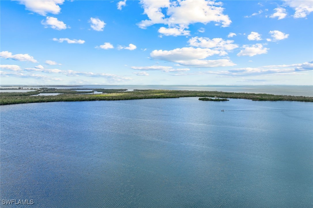 8151 Moyer Lane Bokeelia, FL 33922 - Photo 30 of 49 a view of an ocean and beach
