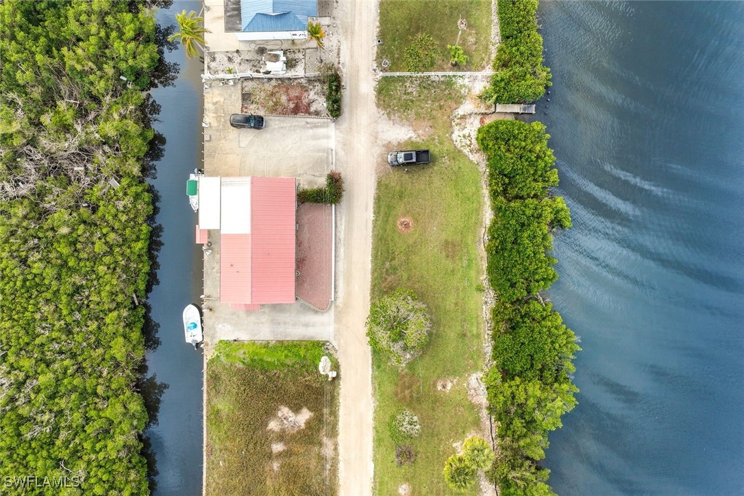 8151 Moyer Lane Bokeelia, FL 33922 - Photo 36 of 49 a front view of a house