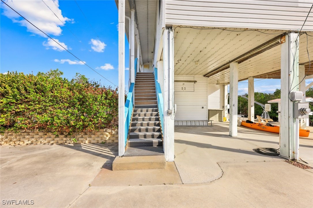 8151 Moyer Lane Bokeelia, FL 33922 - Photo 37 of 49 a view of a entryway door front of house