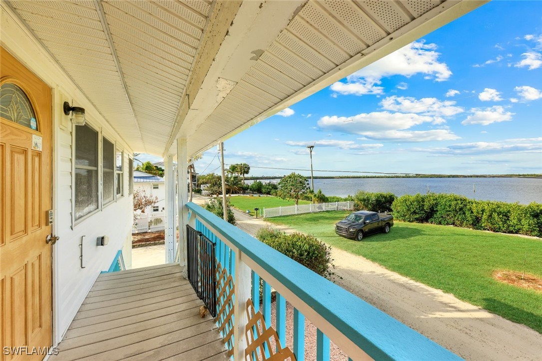 8151 Moyer Lane Bokeelia, FL 33922 - Photo 40 of 49 a view of a balcony with sink and dishwasher