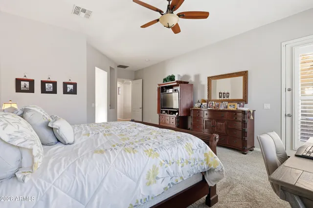 a bedroom with a bed and furniture