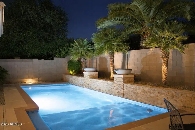 a vase of flowers sitting on a table