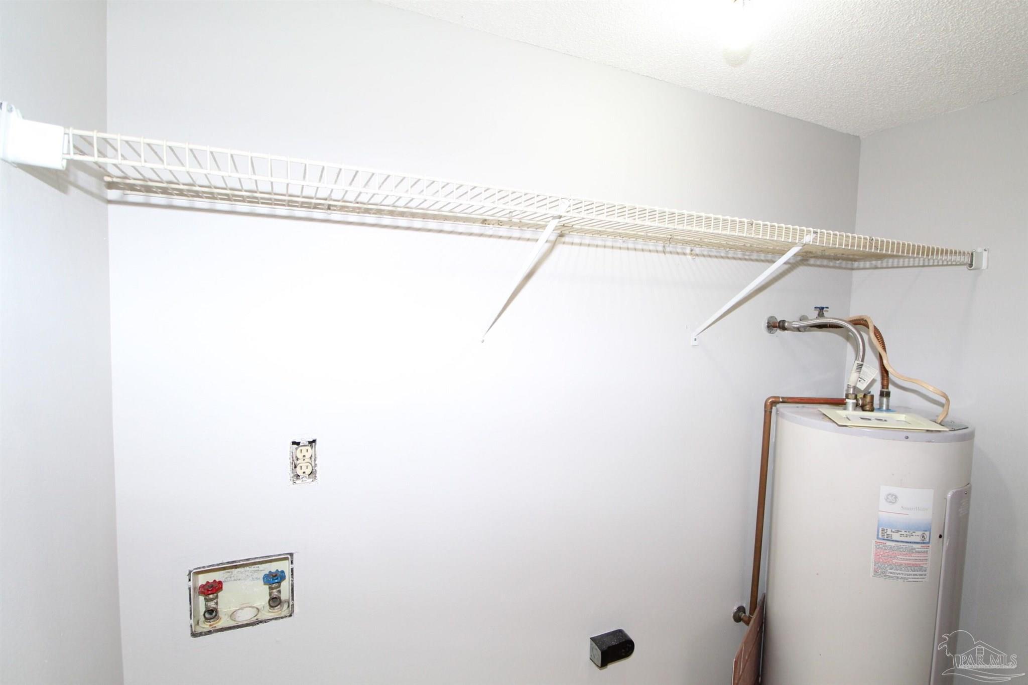 5306 Windham Road Milton, FL 32570 - Photo 12 of 15 a bathroom with a shower and a shower