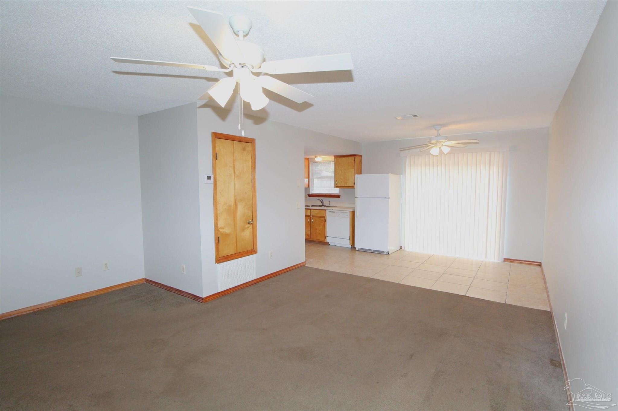 5306 Windham Road Milton, FL 32570 - Photo 3 of 15 a view of an empty room with a window