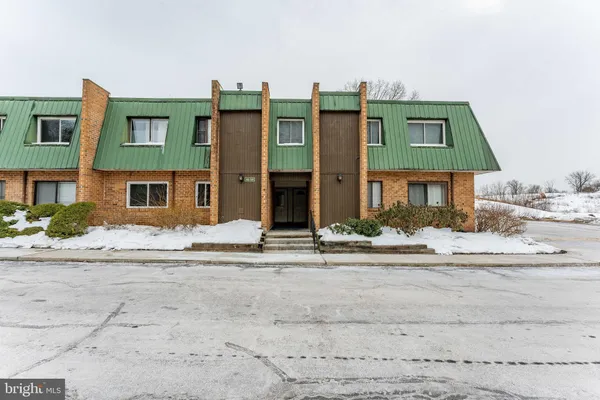 a front view of multiple houses