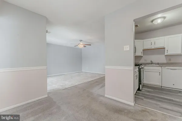 a view of a storage & utility room with a sink
