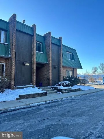 a view of a house with a patio