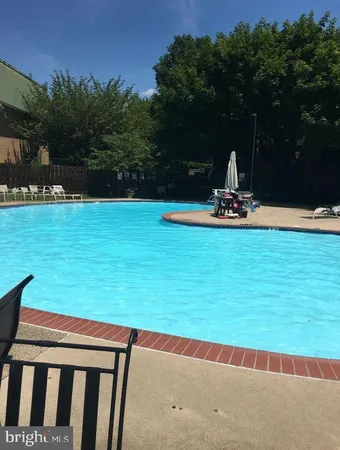 a view of a garden and basketball court