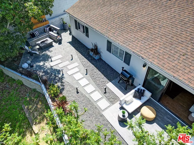 an aerial view of house with yard