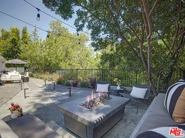 a view of a tables and chairs in patio