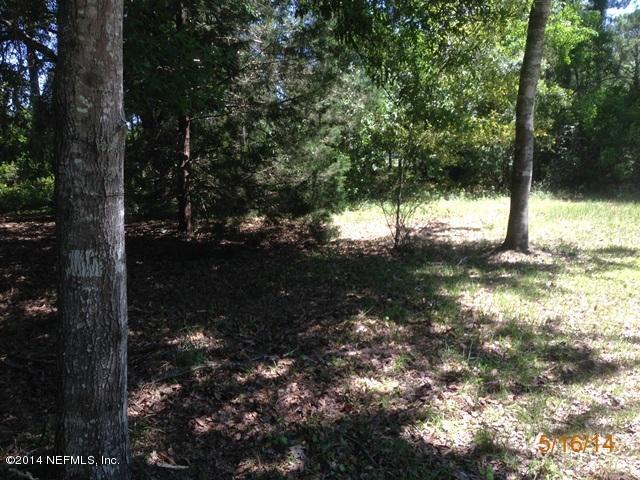 54694 Church Road Callahan, FL 32011 - Photo 12 of 22 a view of a tree in a yard