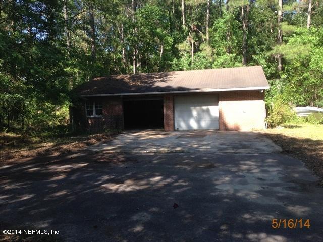 54694 Church Road Callahan, FL 32011 - Photo 21 of 22 a front view of a house with a yard