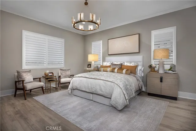 a bedroom with bed and a window